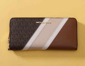 Michael Kors トラベルコンチネンタル ラゲッジマルチ